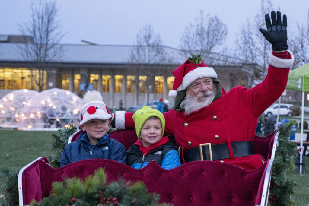 santa and children in sleigh
